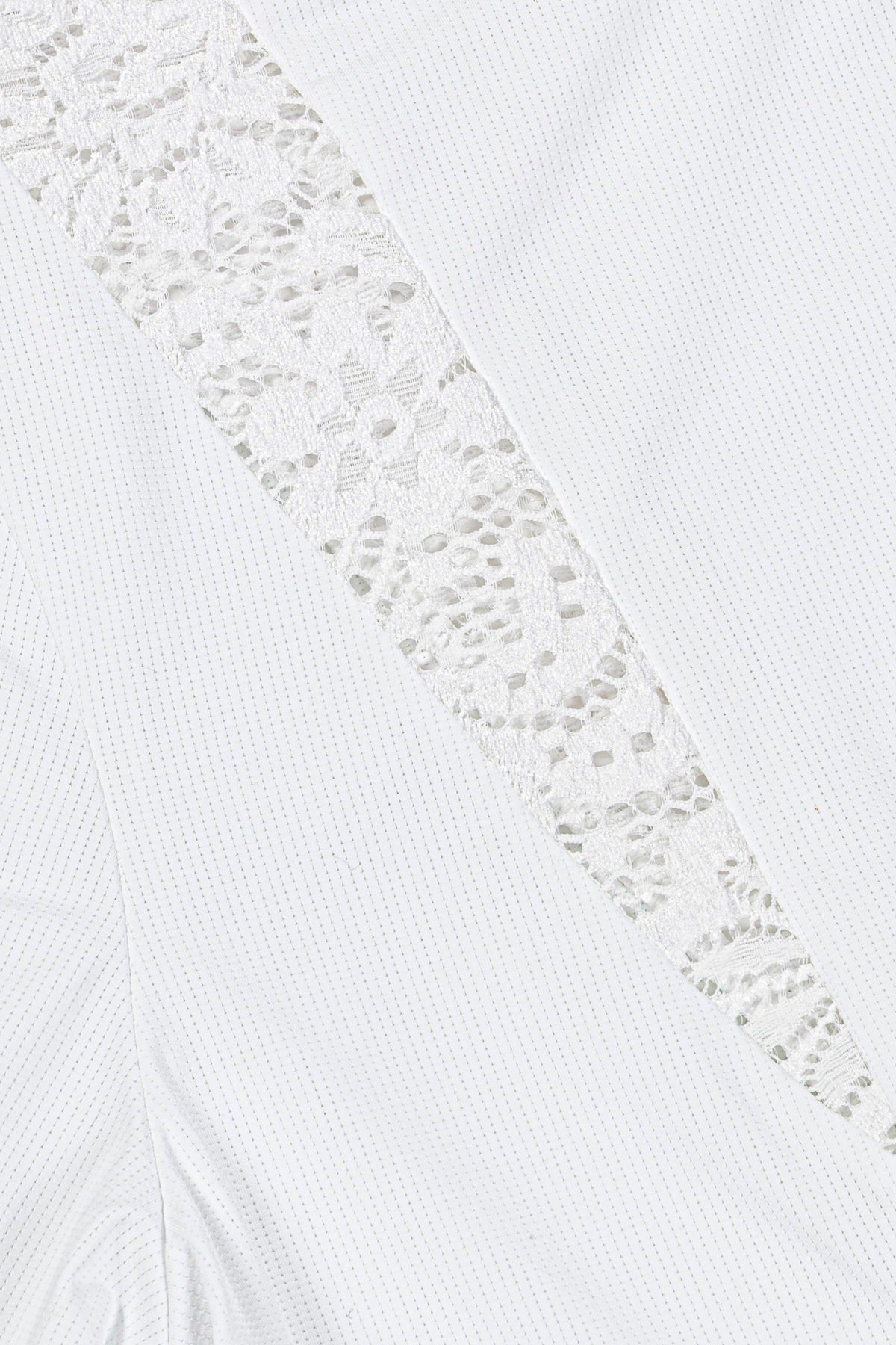 Hannah Childs Farrah Lace turtleneck training top in White with lace insets